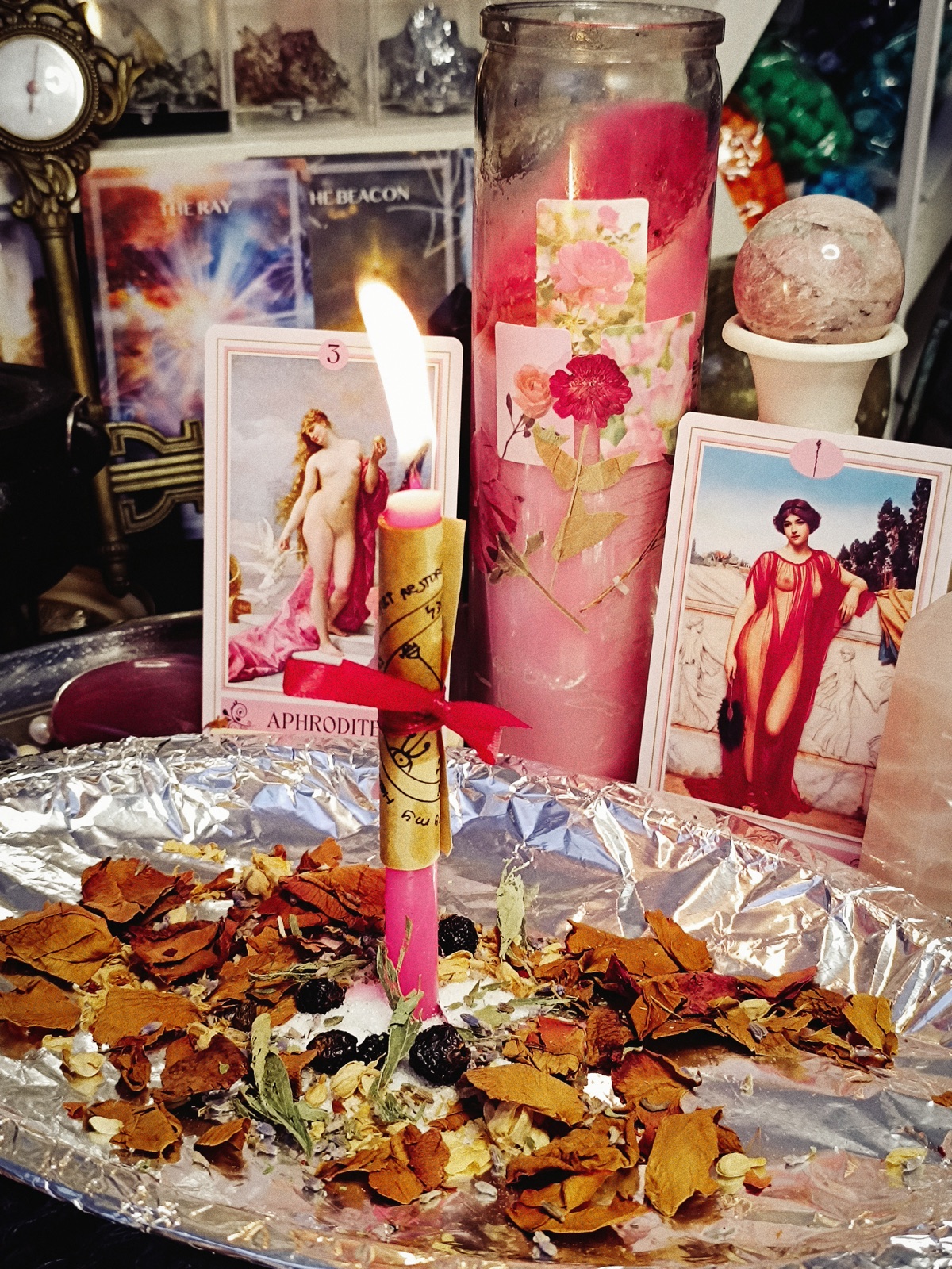 Venus in Bloom altar with candlelight, roses, and crystals